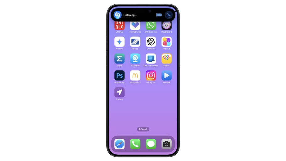 Écran du0027iPhone affichant diverses icônes du0027applications sur fond violet.