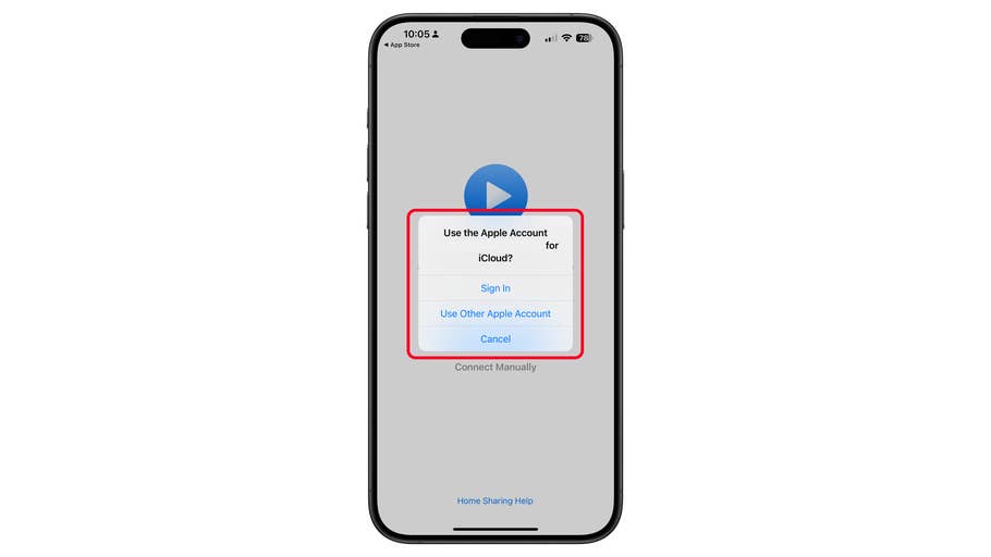 Écran du0027iPhone affichant une pop-up demandant du0027utiliser un compte Apple pour iCloud avec des options pour se connecter ou annuler.