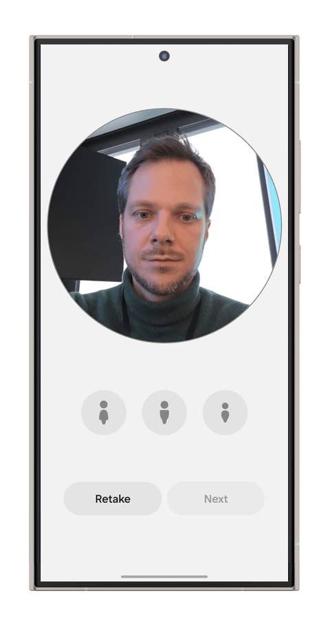 Un écran de smartphone affichant un selfie avec des options pour refaire ou continuer.