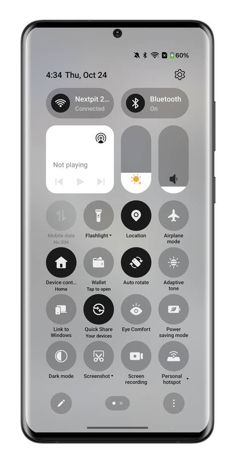 Interface de smartphone OnePlus affichant les paramètres rapides et les notifications.