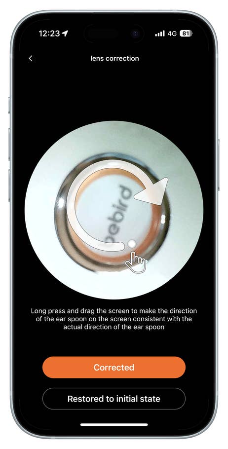 Interface de correction de lentille montrant des instructions pour aligner une cuillère du0027oreille.