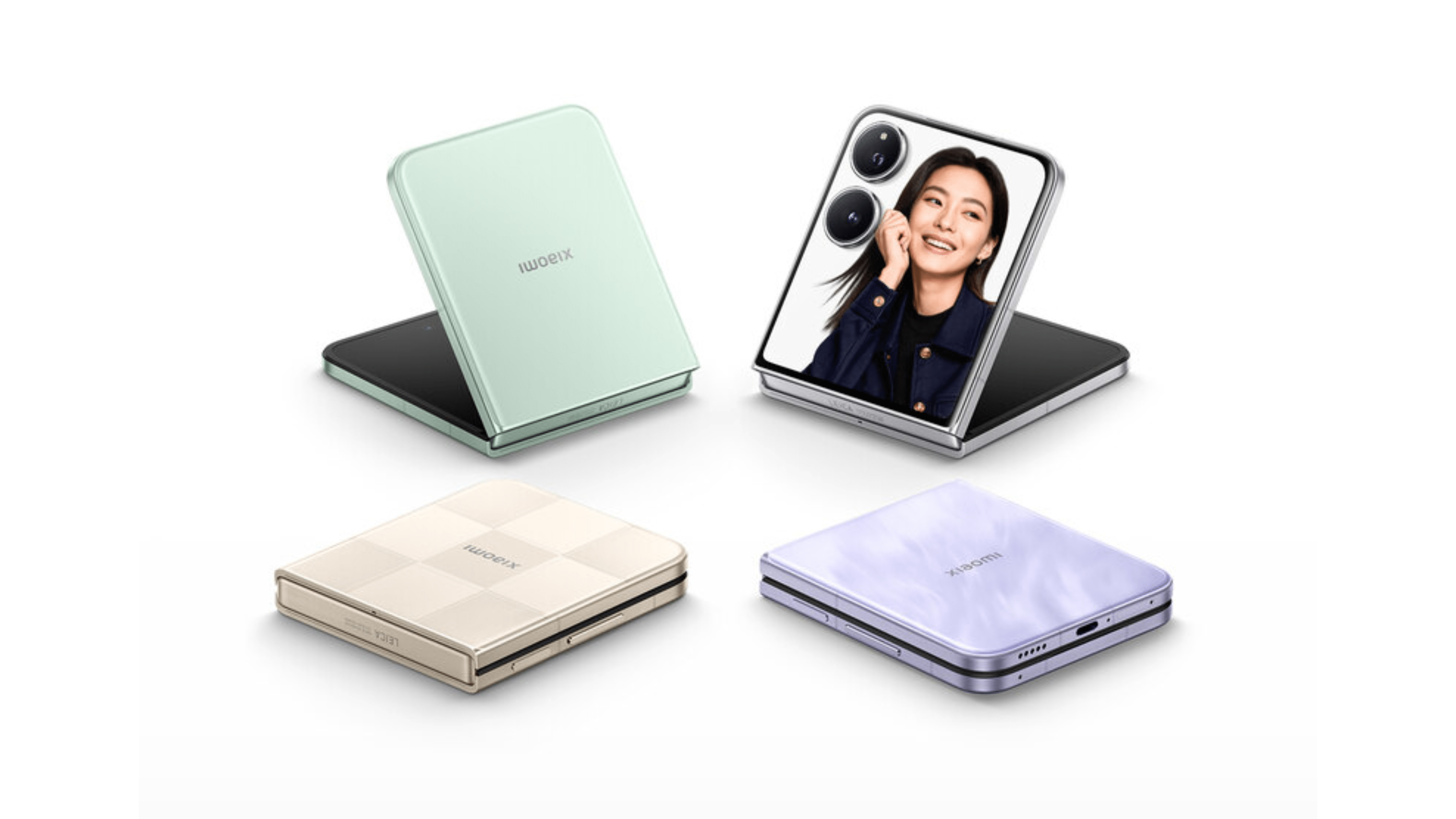 Quatre smartphones Xiaomi Mix Flip 2 de différentes couleurs : vert menthe, beige, violet clair et noir plié.